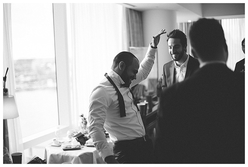 Guests watching the wedding ceremony of Lisa and Alex Gaskarth, sharing in the joy and emotion of the occasion.