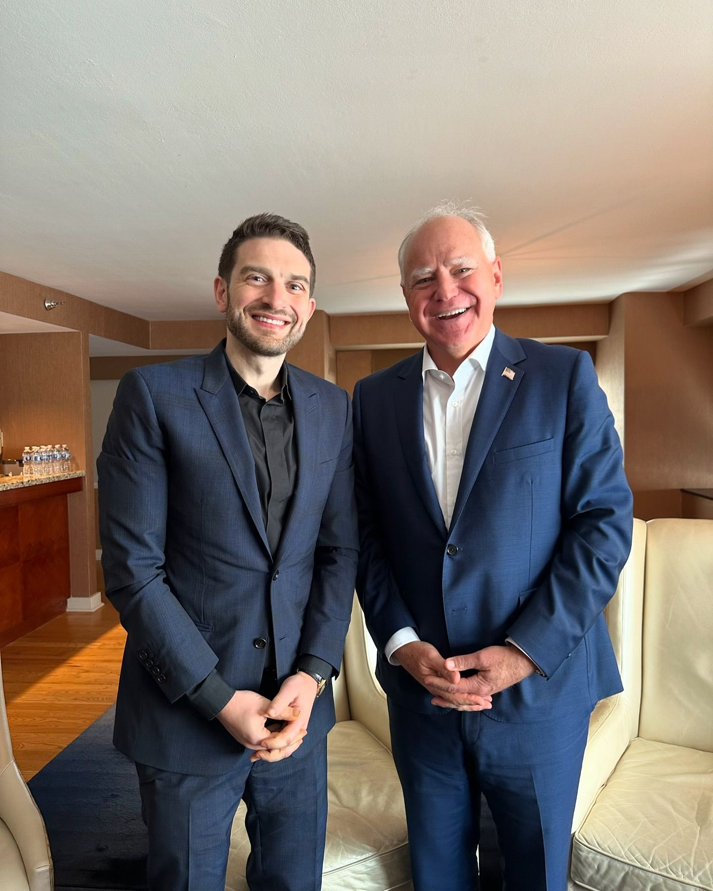 Alex Soros meeting Tim Walz at the Democratic National Convention, reflecting his engagement in national politics.