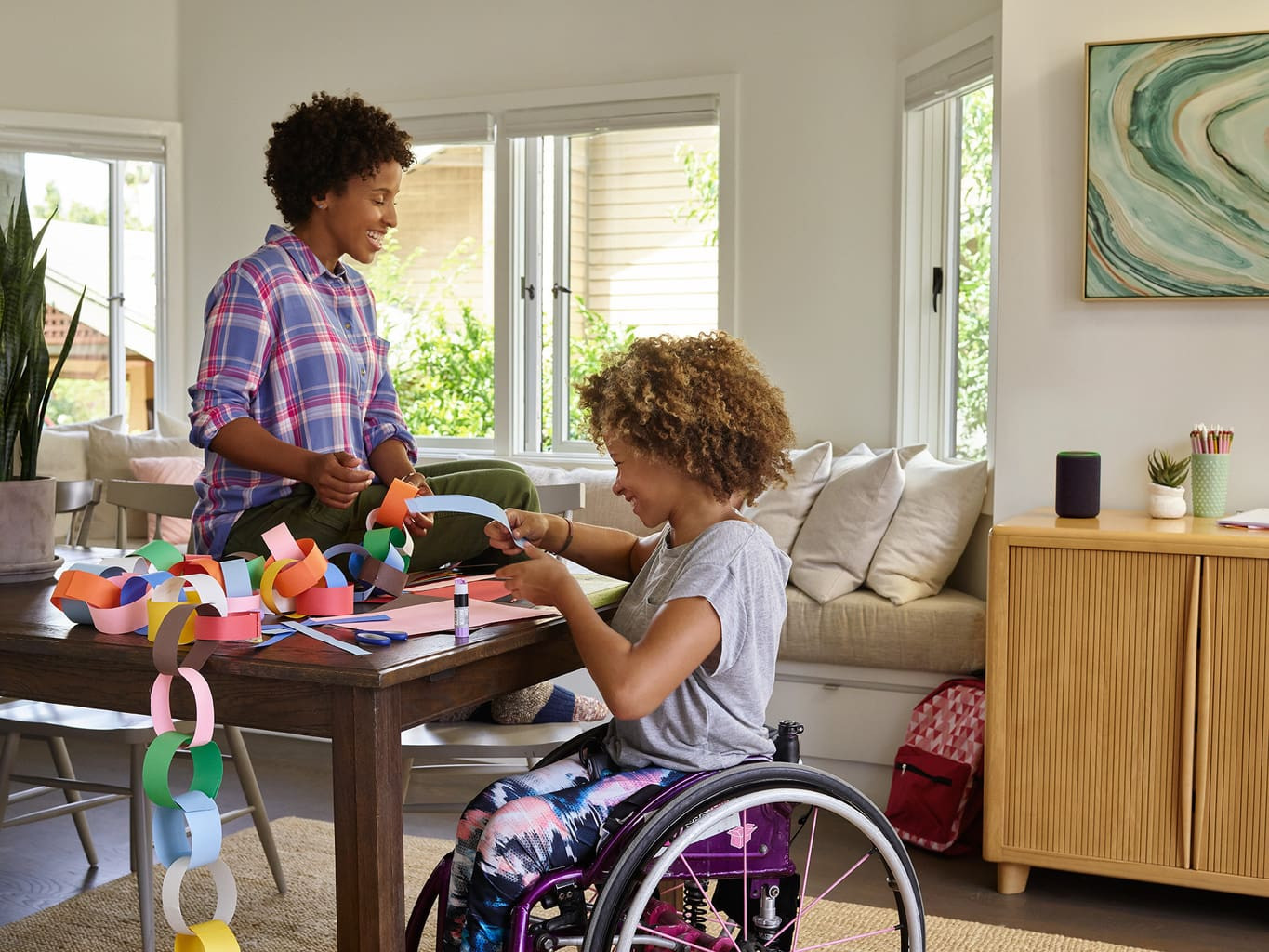 Audioengine wireless speakers paired with Amazon Echo in a living room, demonstrating enhanced audio for smart homes.