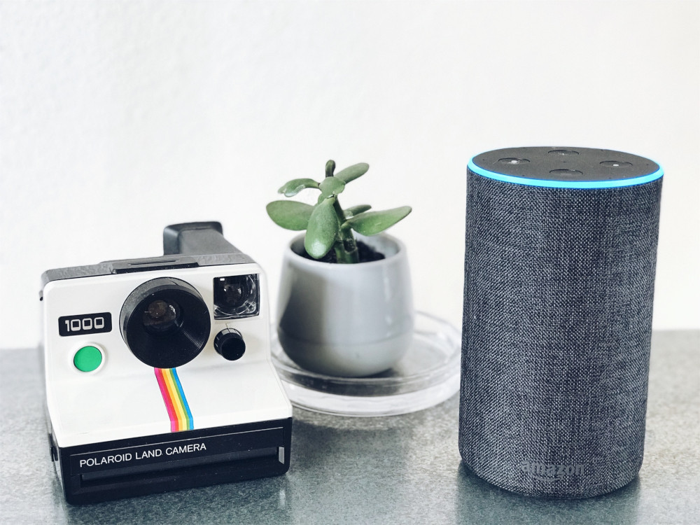 Amazon Echo glowing in blue colour