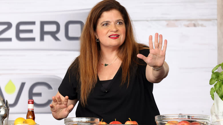 Alex Guarnaschelli holds up her hand